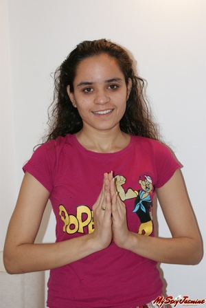 Cool Indian teen in pink T-shirt is ready to get naked to demonstrate her fresh body - Picture 1