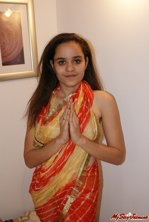 Nasty Indian teen Jasmine taking off her nice sari to expose her lovely tits - Picture 1
