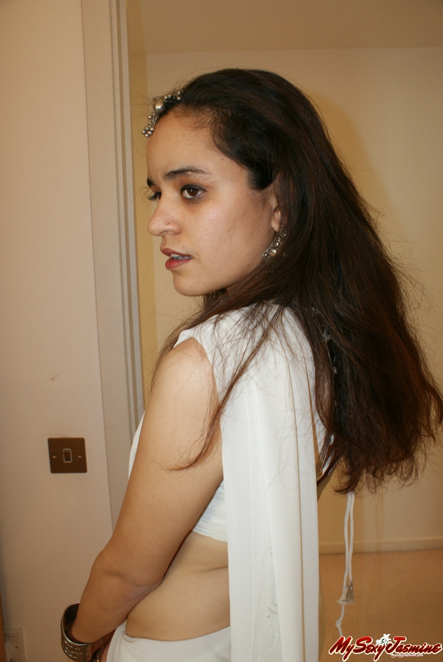 Good-looking Indian chick stripping her white clothes on cam and staying only in blue panties and bracelets - XXXonXXX - Pic 2