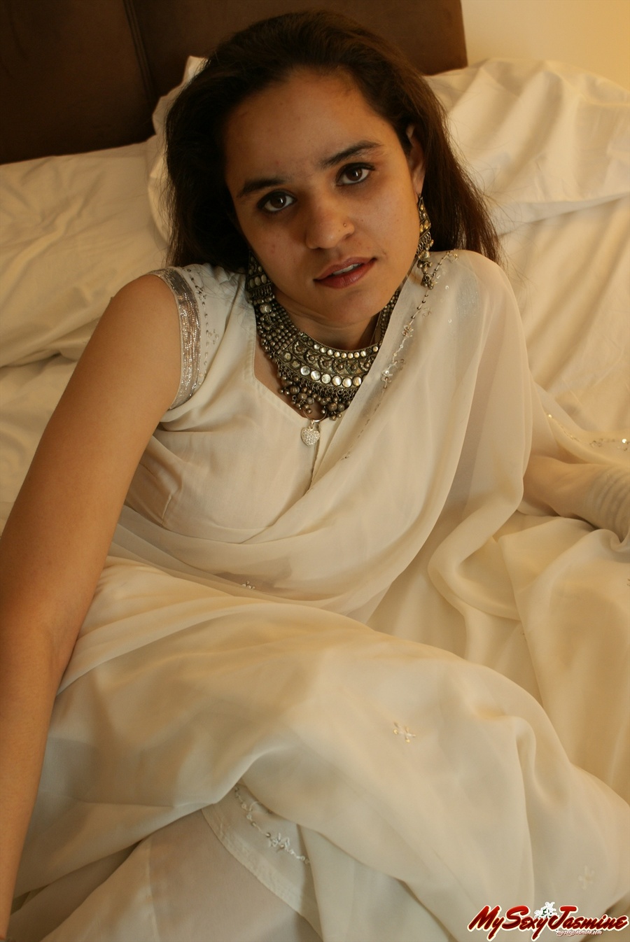 Good-looking Indian chick stripping her white clothes on cam and staying only in blue panties and bracelets - XXXonXXX - Pic 3