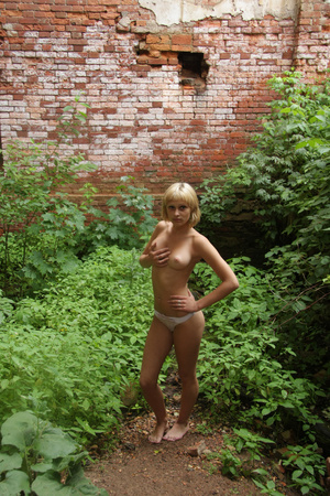 Nice blonde teen in a short skirt undresses in the abandoned old building on cam - Picture 7