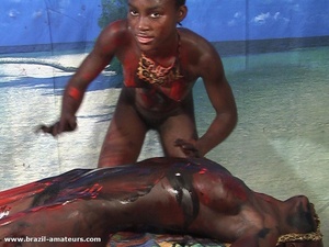 Naughty black tropical gals in G strings soiling each other with paints while having wild lesbian games - XXXonXXX - Pic 1