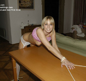 Slim Suzanna in sexy white lingerie is bent over the table and wanna be