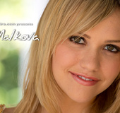 Very hot blonde gymnast in sexy lingerie toying her cooch with a pink