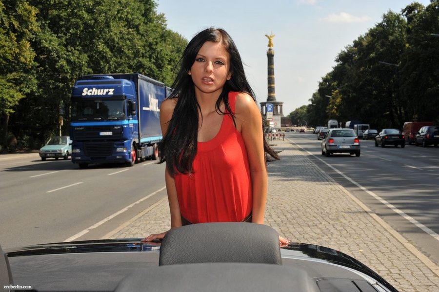 Brunette chick in a red dress posing outdoo - XXX Dessert - Picture 10