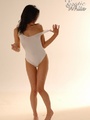 Bodacious brunette gal in a white dres - Picture 3