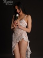 Lovely brunette girl in a white lace - Picture 9