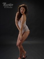 Curly long-haired brunette beauty taking - Picture 8