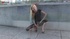 Blonde girl gets naughty and shows off her bald pussy through the hole