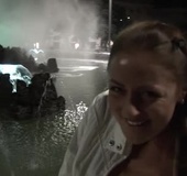Ponytailed red bitch in a white suit with pants drilling her cooch with