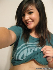 Lovely teen girl in a green T-shirt taking her own pics - Picture 3
