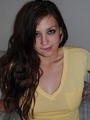 Dirty brunette teen in a yellow T-shirt - Picture 2