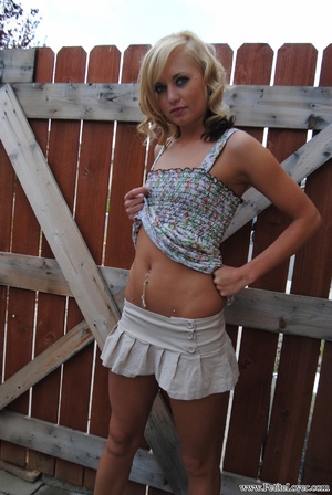 Lovely teen blond in a nice flowered dre - Picture 3
