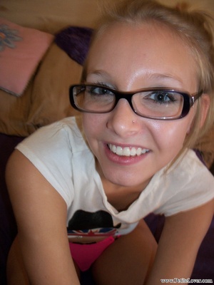 Blonde teen in a white T-shirt and strip - Picture 12