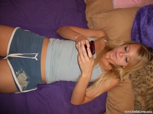 Blonde petite teen in a blue shorts posi - Picture 8