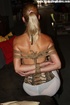 Lovely gagballed blonde full dressed gets roped tightly and dropped to