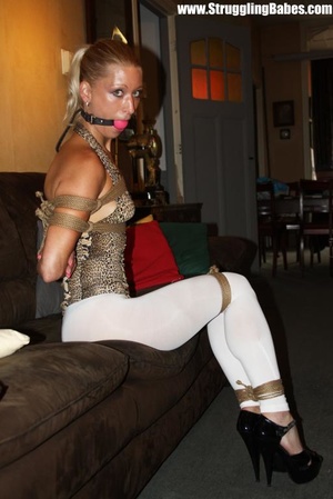 Lovely gagballed blonde full dressed get - Picture 5