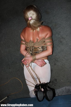 Lovely gagballed blonde full dressed get - Picture 12