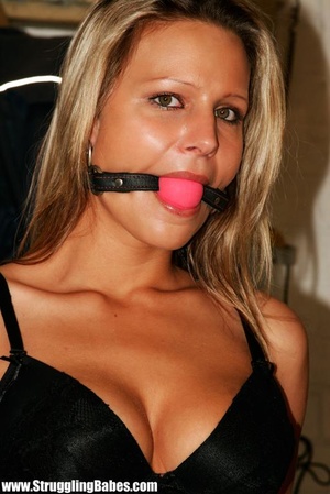 Blonde chick with a gag-ball and bound t - Picture 2