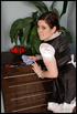 Chubby red chick in a satin room maid uniform and stockings playing with