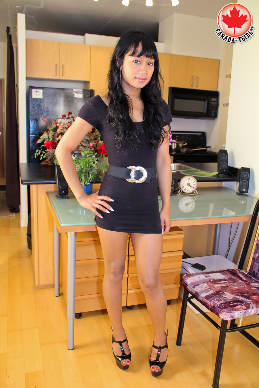 Swarthy Asian T-girl in a black dress and h - XXX Dessert - Picture 1