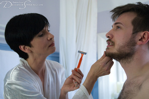 Brunette mom shaving a guy in a blue shi - Picture 3
