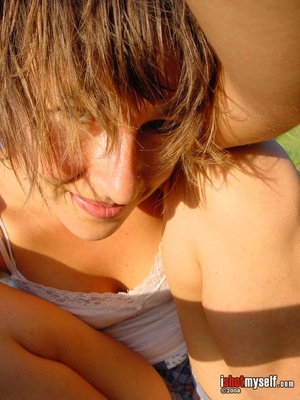 Hot short-haired girl with small tits taking off he blue panties to demonstrate her hairy snatch outdoors - Picture 2