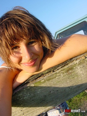 Hot short-haired girl with small tits taking off he blue panties to demonstrate her hairy snatch outdoors - XXXonXXX - Pic 3