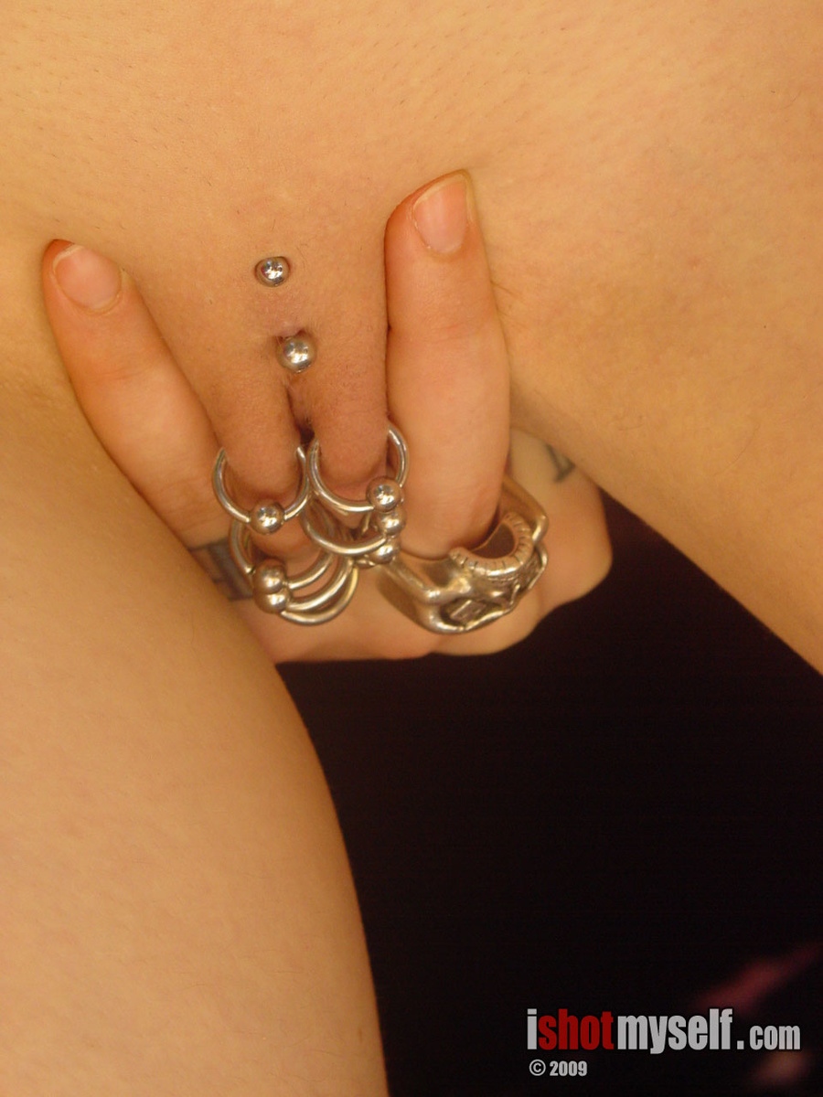 Dirty brunette gal taking off her black lingerie to demonstrate her tattooed body and pierced cooch - XXXonXXX - Pic 11