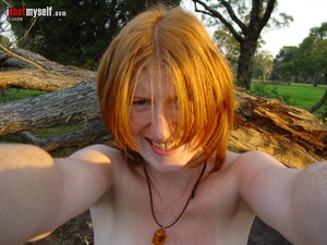 Nasty ginger teen bitch loves posing on cam naked showing off her shaggy red cooch outdoors - Picture 13