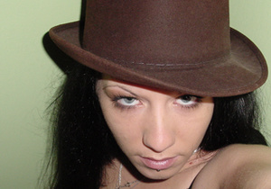 Very hot brunette taking her own picture through the mirror in a hat - XXXonXXX - Pic 6