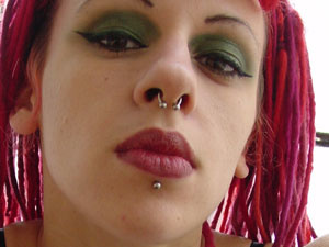 Gloom emo girl with pink hair and pierced nose and lip shot herself on her camera - Picture 3