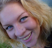 Dirty ginger girl in glasses took her own picture on her mobile