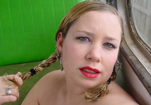 Chubby teen with two plaits shooting herself nude - Picture 1