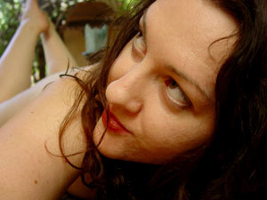 Freak girl shooting herself naked laying on the ground - Picture 1