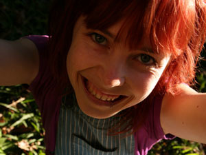 Kinky teen in a red wig with a Mermaid doll in her teeth shot herself on mobile - XXXonXXX - Pic 2