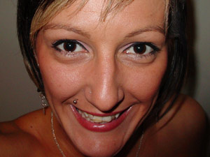 Hot mom with a pierced lip shooting herself on cam for the Internet site - Picture 3