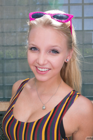 Pretty blonde teen in glasses and stripe - Picture 6