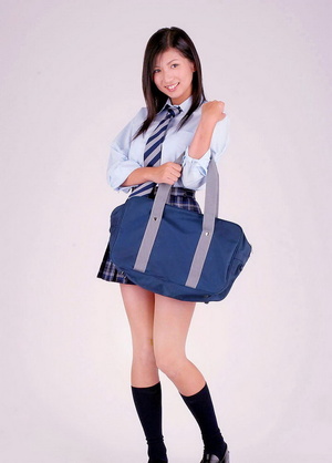 Lovely Japanese school girl takes off her uniform to pose in her lingerie - Picture 1