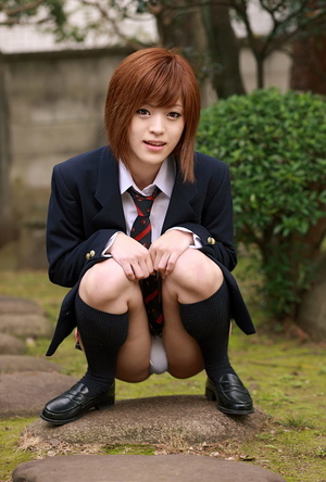 Red Asian school girl posing in fishnet  tights and bikini - Picture 5