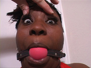 Dirty ebony mom with big tits in a red top gets gag-balled before dirty banging