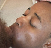 Ponytailed ebony slut with big booty gives head to her white fucker