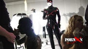 Blonde bound girl gets pissed by master and mistress in latex suits