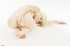 Slim blonde teen Jenny posing nude on white fluffy fur