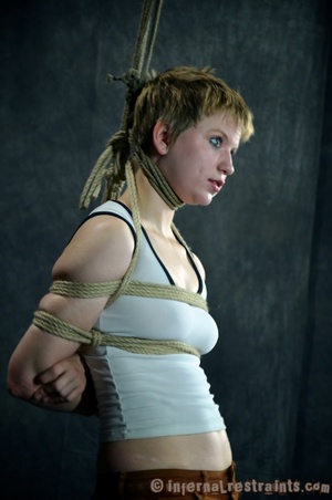 Blonde teen roped in a mask waiting her  - Picture 6