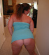 Curly long-haired mom with ponytail showing ass