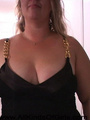 Fat blonde mom in black dress and golden - Picture 1