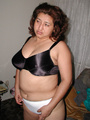 Big-titted latina mom undresses - Picture 3