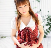 Red Japanese girl in funny red dress and boots posing without panties