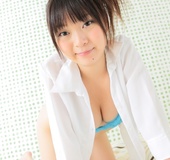Busty Japanese teen in white dress changing into blue bikini